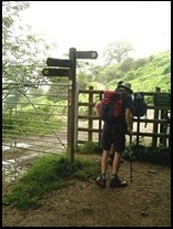Larry at one of the entrances to Eastnor Park admiring his feet! .